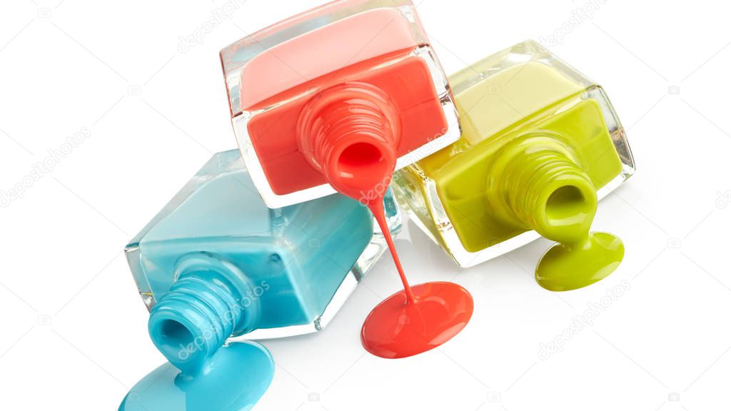 Bottles with nail polishes isolated on white background