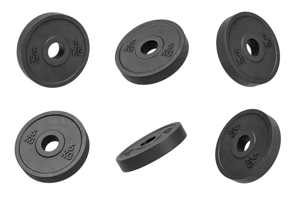 Representación 3d de muchos aislado negro 5 kg pesas de la campana de barras que cuelgan sobre un fondo blanco girado a diferentes lados . —  Fotos de Stock