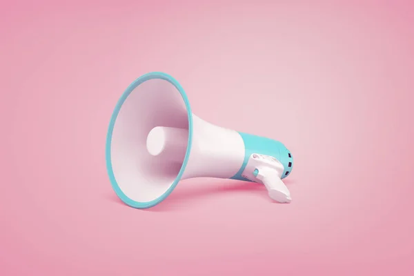 Um megafone sem fio portátil branco e azul repousa sobre um fundo rosa pastel . — Fotografia de Stock