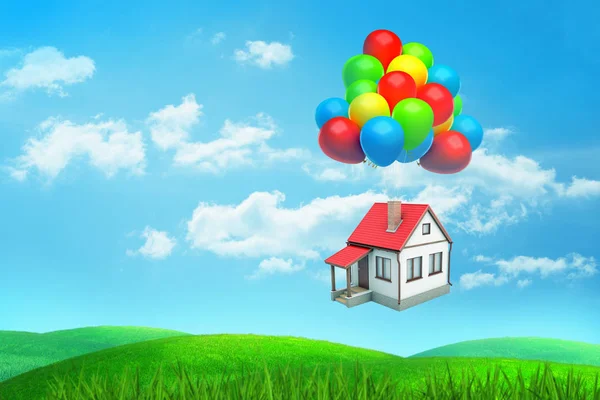 3d renderização um escrever vermelho-telhado casa voa pendurado em muitos balões coloridos sobre um campo verde . — Fotografia de Stock