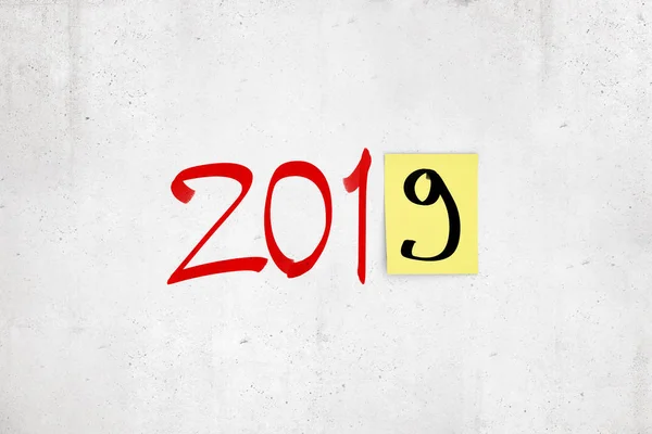 3d rendering of 2019 red marker sign with black 9 on post-it yellow note on white background