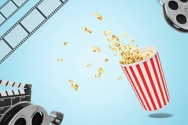 3d renderinf of a popcorn bucket with popcorn, film reel and a movie clapper on bluebackground