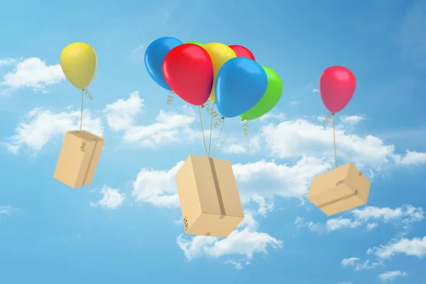 3d representación de cajas de cartón unidas a globos de colores en el aire con cielo azul y nubes blancas en el fondo — Foto de Stock