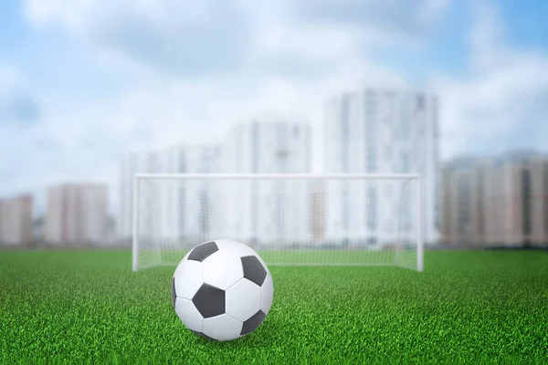 3d renderização de bola de futebol, portão e campo com edifícios da cidade no fundo — Fotografia de Stock