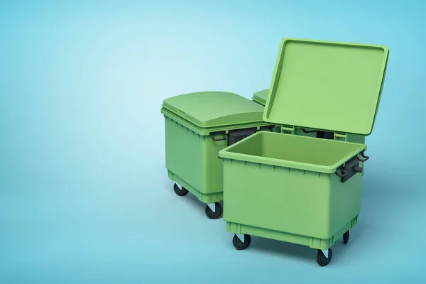 3d rendering of green trash bins on blue background — Stock Photo, Image