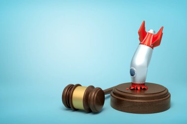 Hakim toklak açık mavi arka plan üzerinde yanında yatan ile sondaj bloğu üzerinde çöktü uzay roketi baş aşağı 3d render.