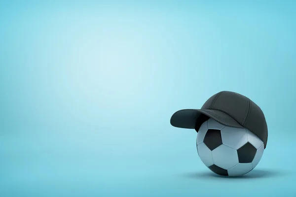 3D renderização de uma bola de futebol usando um boné preto em um fundo azul claro . — Fotografia de Stock