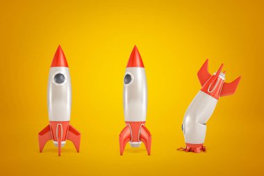 Üç roket gemisinin arka arkaya 3boyutlu görüntülenme, iki dik duran ve bir çarpışma baş aşağı indi, kehribar arka plan üzerinde.