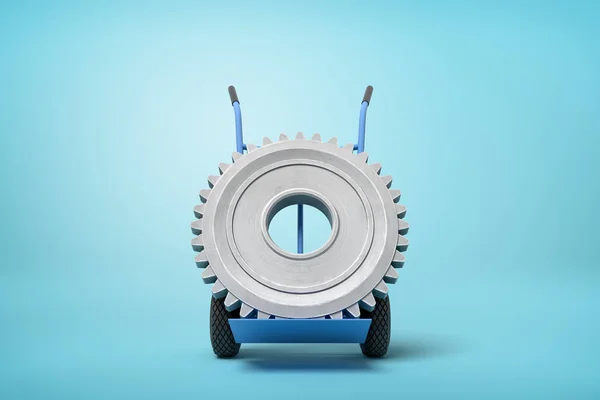 3D-rendering van Big Grey Wheel Gear op blauwe handtruck die in half-turn op licht blauwe achtergrond met veel Kopieer ruimte staat. — Stockfoto
