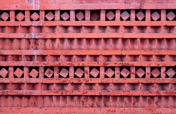 Macro Photo Mur Briques Ornementales Rouges Avec Différents Motifs Géométriques — Photo