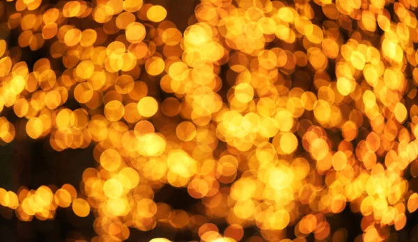 Bela foto brilhante de círculos dourados cintilantes macro — Fotografia de Stock