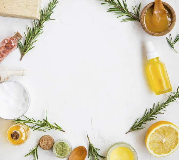 Natural skincare ingredients with manuka honey, lemon, essential