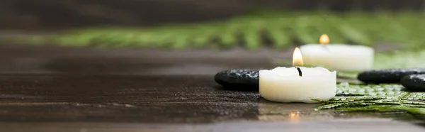 Spa Stilleven met kaarsen en massage stenen — Stockfoto