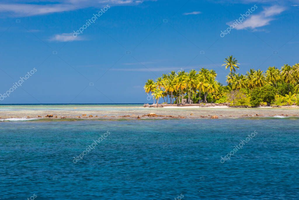 Idyllic white beach in front of the turquoise tropical sea. Exotic island paradise banner. Tropical landscape, seascape. Colorful view, sea horizon. Tranquil, relax beach coast, island shore. Amazing nature landscape background