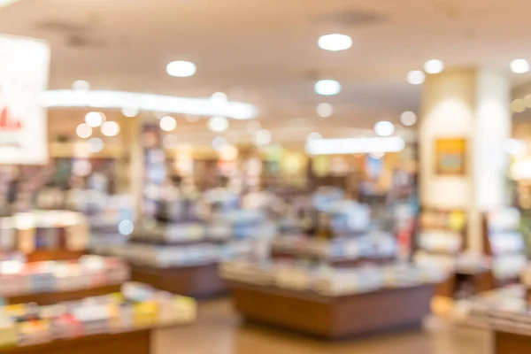 Blurred photo of book store. Bookshop interior Book shelf blur background Store Retail business