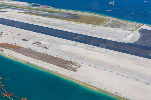 The airport in Male, Maldives, Indian ocean. Airport Maldives Male city island aerial photo sea