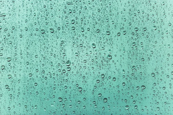 Краплі Води Склянці Синякового Кольору Вода Падає Текстури Фону Красиві — стокове фото