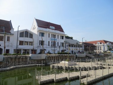JAKARTA, INDONESIA - July 7, 2018: Old buildings beside Krukut River on Kali Besar, Kota Tua.