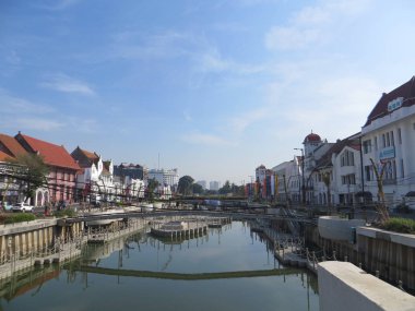 JAKARTA, INDONESIA - July 7, 2018: Old buildings beside Krukut River on Kali Besar, Kota Tua.