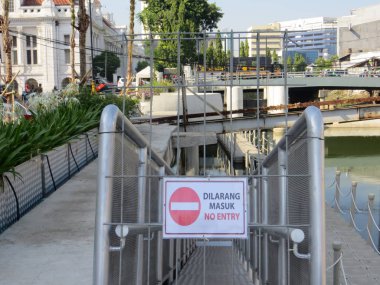 JAKARTA, INDONESIA - July 7, 2018: A sign of entry ban of Taman Apung Kali Besar, Kota Tua.