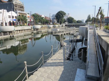 JAKARTA, INDONESIA - July 7, 2018: Old buildings beside Krukut River on Kali Besar, Kota Tua.