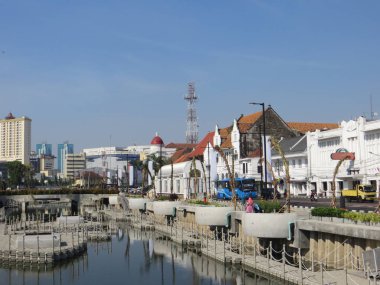 JAKARTA, INDONESIA - July 7, 2018: Old buildings beside Krukut River on Kali Besar, Kota Tua.