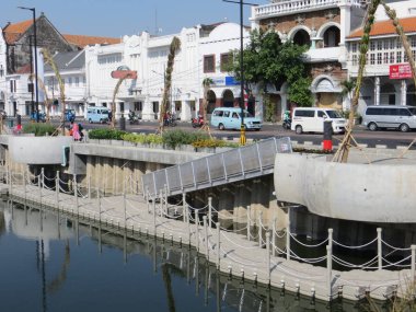 JAKARTA, INDONESIA - July 7, 2018: Old buildings beside Krukut River on Kali Besar, Kota Tua.