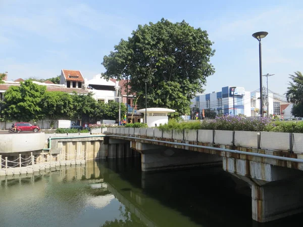 JAKARTA, INDONESIA - July 7, 2018: Pedestrian bridge on Krukut River Kali Besar in Kota Tua.
