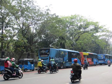 JAKARTA, INDONESIA - August 2, 2018: Urban transportation on Jalan Katedral.