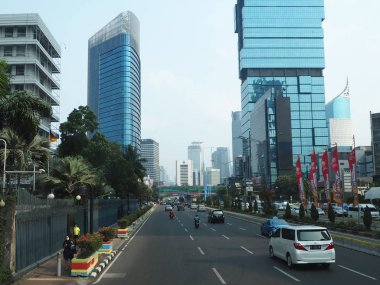 JAKARTA, INDONESIA - August 24, 2018: Traffic on Jalan Sudirman (Sudirman road).