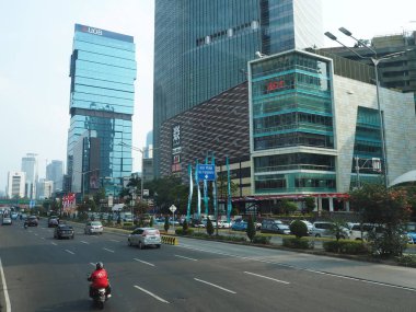 JAKARTA, INDONESIA - August 24, 2018: Traffic on Jalan Sudirman (Sudirman road).