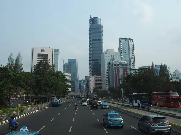 JAKARTA, INDONESIA - August 24, 2018: Traffic on Jalan Sudirman (Sudirman road).