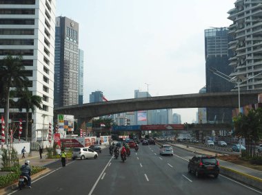 JAKARTA, INDONESIA - August 24, 2018: Traffic on Jalan Sudirman around Karet Flyover.