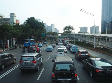 JAKARTA, INDONESIA - August 24, 2018: Traffic on Jalan Sudirman (Sudirman road).
