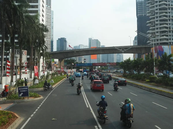 JAKARTA, INDONESIA - August 24, 2018: Traffic on Jalan Sudirman around Karet Flyover.