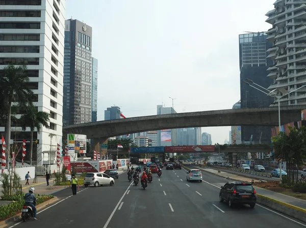 JAKARTA, INDONESIA - August 24, 2018: Traffic on Jalan Sudirman around Karet Flyover.