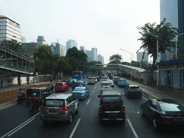 JAKARTA, INDONESIA - August 24, 2018: Traffic on Jalan Sudirman (Sudirman road).