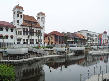 JAKARTA, INDONESIA - August 7, 2018: Vintage Dutch colonial buildings beside Krukut River on Kali Besar, Kota Tua.