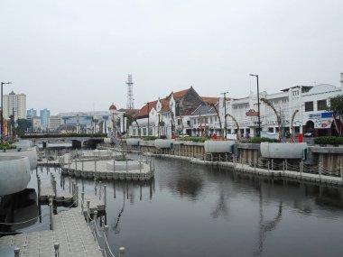 JAKARTA, INDONESIA - August 7, 2018: Vintage Dutch colonial buildings beside Krukut River on Kali Besar, Kota Tua.