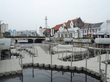 JAKARTA, INDONESIA - August 7, 2018: Vintage Dutch colonial buildings beside Krukut River on Kali Besar, Kota Tua.