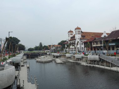 JAKARTA, INDONESIA - August 7, 2018: Vintage Dutch colonial buildings beside Krukut River on Kali Besar, Kotesara Tua.