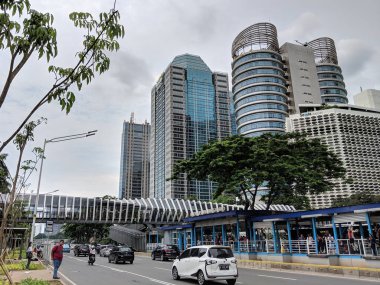 Jakarta, Indonesia - February 16, 2019: Traffic on Sudirman street in Senayan district.