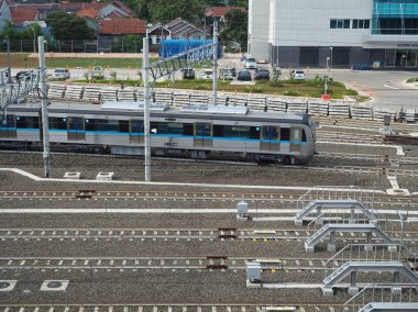 Jakarta, Endonezya - 23 Mart 2019: Arka planını Lebak Bulus Mrt depo demiryolu parça.