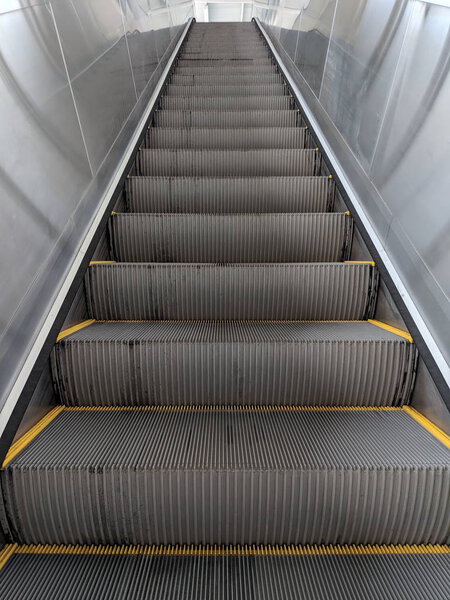 Jakarta, Indonesia - June 17, 2019: Escalator at Kelapa Gading Boulevard Utara LRT Station.