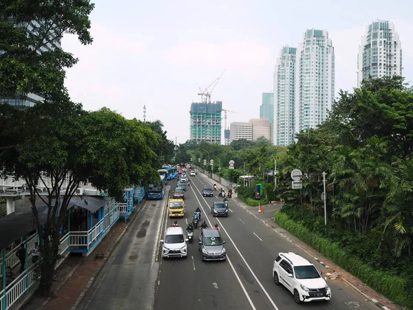 Jakarta, Indonesia - June 17, 2019: Traffic on Setiabudi Tengah street in Dukuh Atas district.