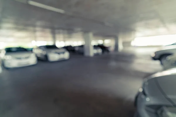 抽象的なぼやけた背景用の屋内の駐車場の画像 — ストック写真