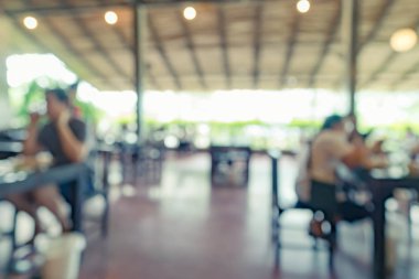 Arka plan kullanımı için restoranda insanların soyut bulanık görüntü