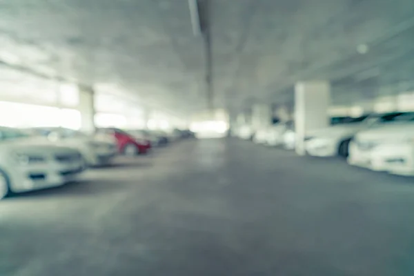抽象的なぼやけた背景用の屋内の駐車場の画像 — ストック写真