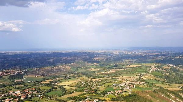 Aerial view on roof, mountains and plans in italian territory