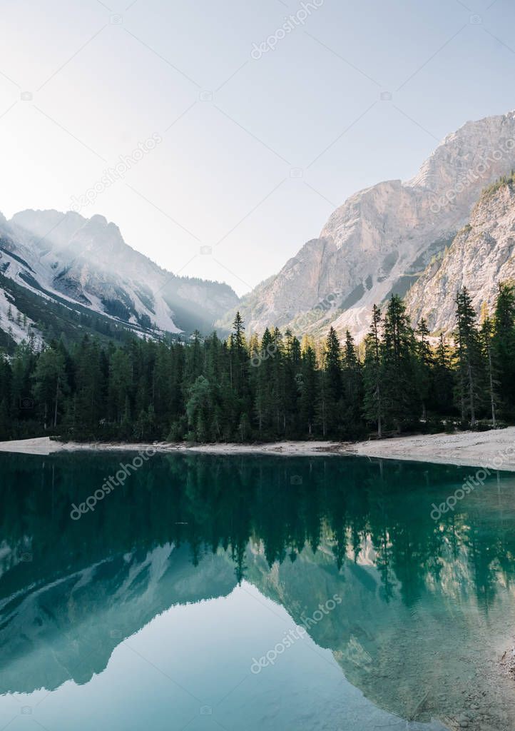 scenic view of fascinating clear lake in mountains, Lago di Braies, Italy